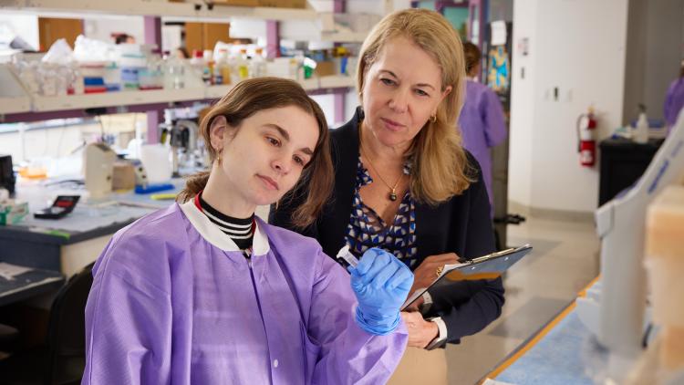 Catherine Bollard with a lab member at Children's National Hospital